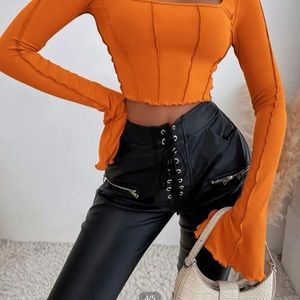 SHEIN neon orange long flare sleeve top with lettuce trim. Ties across shoulders